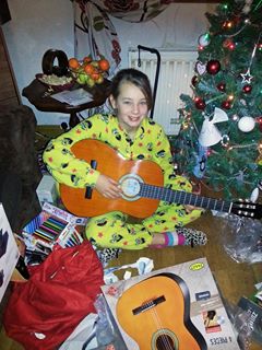 Photo: A budding Rock Star and the other thinks he's one already!  Hey! I'm here for lessons. (tho my guitar has been gathering dust for years).